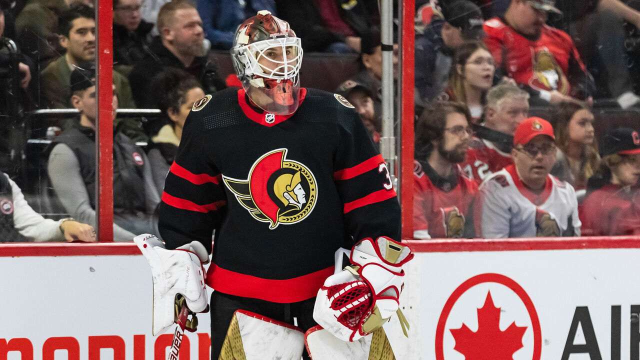 OTTAWA, ON - APRIL 08: Ottawa Senators Goalie Cam Talbot (33) plays the puck during first period National Hockey League action between the Tampa Bay Lightning and Ottawa Senators on April 8, 2023, at Canadian Tire Centre in Ottawa, ON, Canada.
