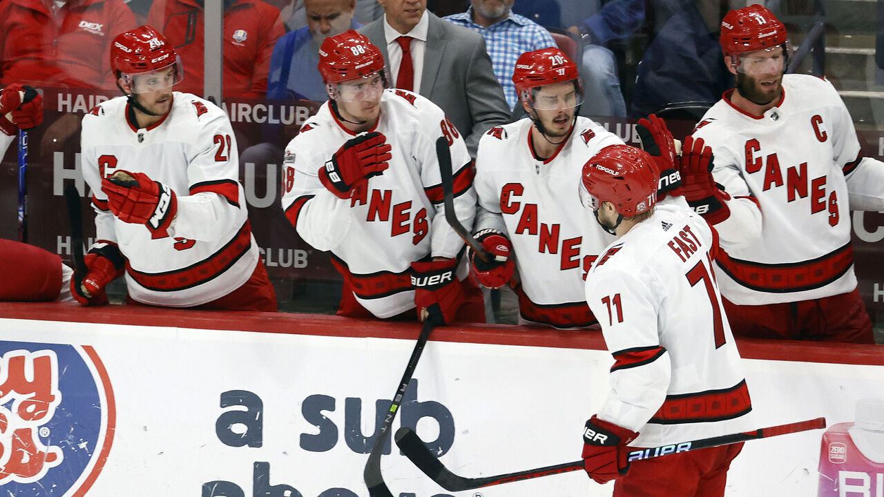 SUNRISE, FL - MAY 24: Teammates congratulate Jesper Fast #71 of the Carolina Hurricanes after he scored a third period goal against the Florida Panthers in Game Four of the Eastern Conference Final of the 2023 Stanley Cup Playoffs at the FLA Live Arena on May 24, 2023 in Sunrise, Florida.