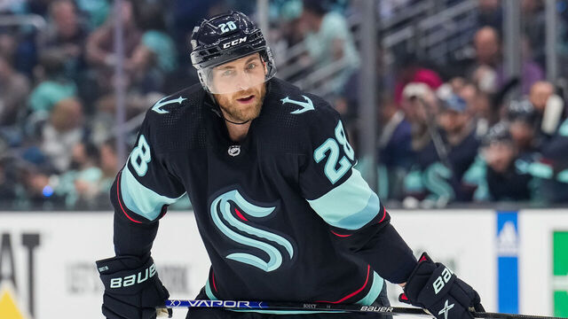 SEATTLE, WASHINGTON - MAY 13: Carson Soucy #28 of the Seattle Kraken looks on during the third period against the Dallas Stars in Game Six of the Second Round of the 2023 Stanley Cup Playoffs at Climate Pledge Arena on May 13, 2023 in Seattle, Washington.