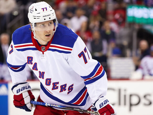 NEWARK, NJ - APRIL 27: New York Rangers defenseman Niko Mikkola (77) looks on during the National Hockey League game between the New York Rangers and the New Jersey Devils on April 27, 2023 at Prudential Center in Newark, NJ.