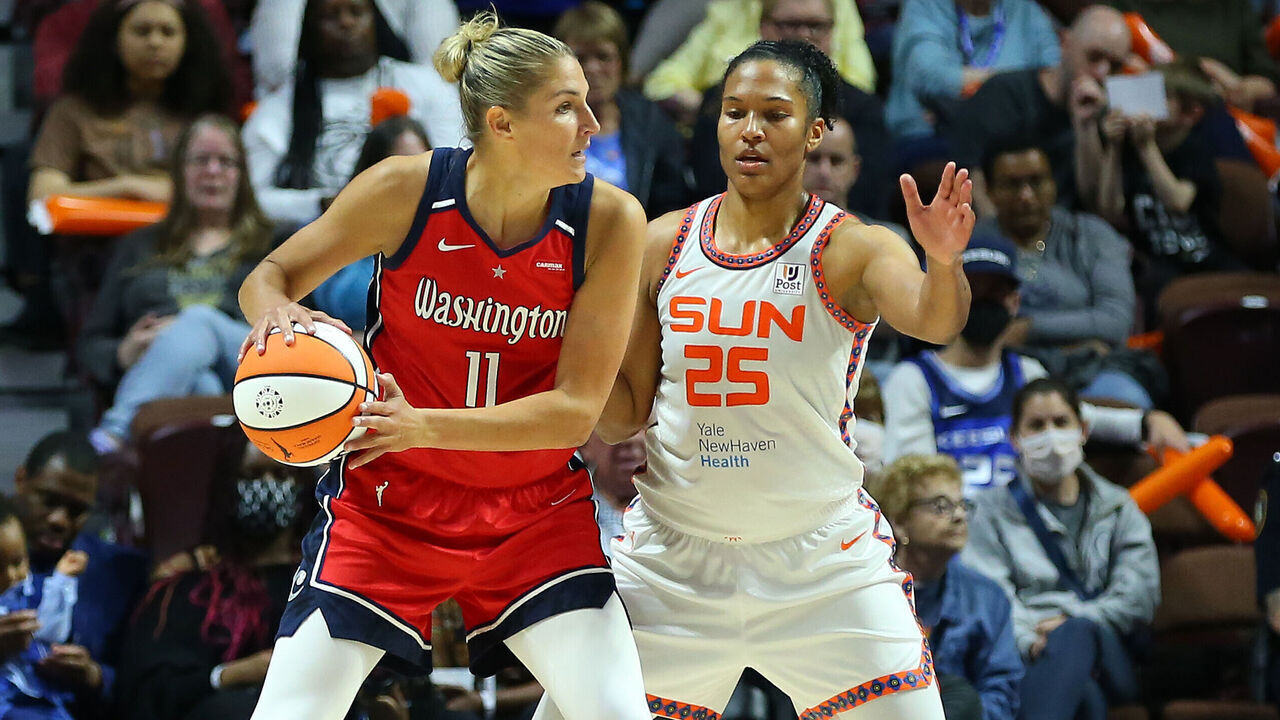 UNCASVILLE, CT - MAY 21: Washington Mystics forward Elena Delle Donne (11) defended by Connecticut Sun forward Alyssa Thomas (25) during a WNBA game between Washington Mystics and Connecticut Sun on May 21, 2023, at Mohegan Sun Arena in Uncasville, CT.