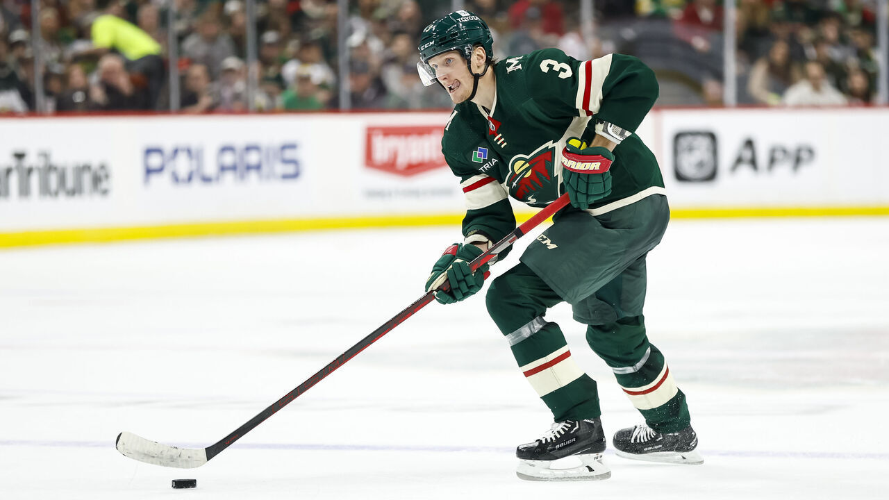 ST PAUL, MN - APRIL 21: John Klingberg #3 of the Minnesota Wild skates with the puck against the Dallas Stars in the second period of Game Three of the First Round of the 2023 Stanley Cup Playoffs at Xcel Energy Center on April 21, 2023 in St Paul, Minnesota. The Wild defeated the Stars 2-1 to take a 2-1 series lead.