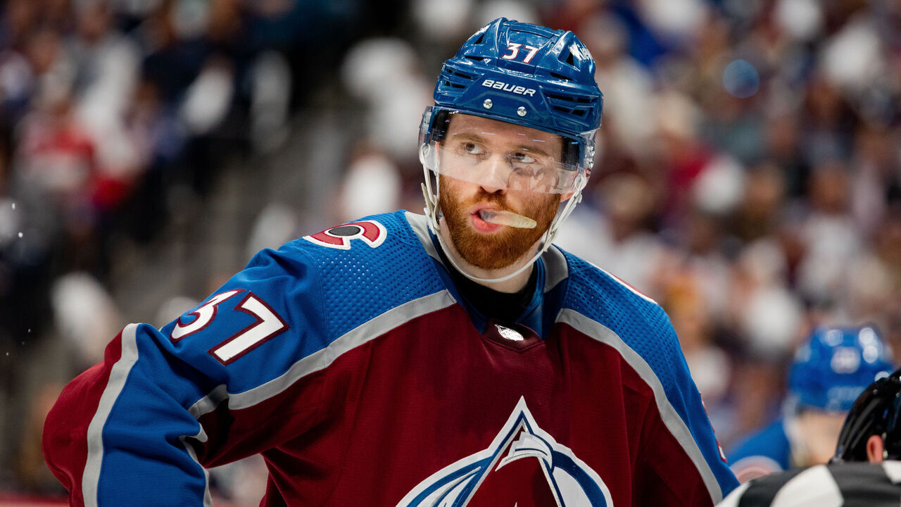 DENVER, COLORADO - APRIL 30: J.T. Compher #37 of the Colorado Avalanche looks over his shoulder ahead of a face-off in Game Seven of the First Round of the 2023 Stanley Cup Playoffs against the Seattle Kraken at Ball Arena on April 30, 2023 in Denver, Colorado.