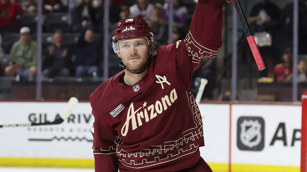 TEMPE, ARIZONA - MARCH 26: Christian Fischer #36 of the Arizona Coyotes celebrates after scoring a goal against the Colorado Avalanche during the NHL game at Mullett Arena on March 26, 2023 in Tempe, Arizona. The Avalanche defeated the Coyotes 4-3 in an overtime shootout.