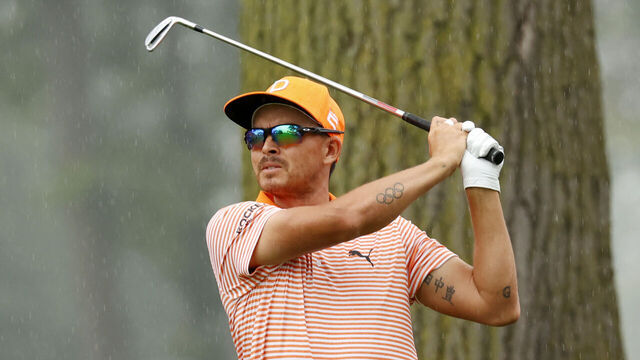 DETROIT, MI - JULY 02: PGA golfer Rickie Fowler hits his tee shot on the 5th hole on July 2, 2023, during the final round of the Rocket Mortgage Classic at the Detroit Golf Club in Detroit, Michigan.