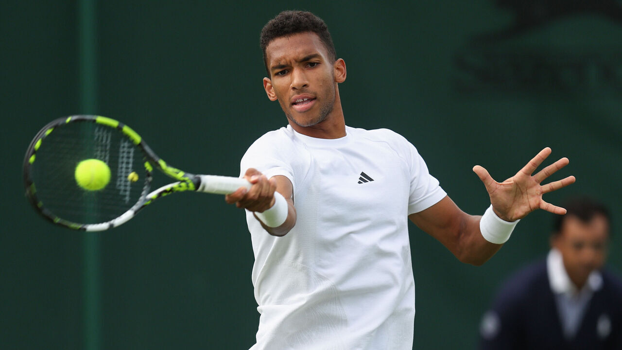 LONDON, ENGLAND - JULY 03: Felix Auger-Aliassime (CAN) in action during his Gentlemen's Singles 1st Round match against Michael Mmoh (USA) during day one of The Championships Wimbledon 2023 at All England Lawn Tennis and Croquet Club on July 3, 2023 in London, England.
