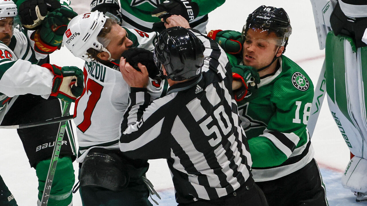 DALLAS, TX - APRIL 19: Minnesota Wild left wing Kirill Kaprizov (97) and Dallas Stars center Max Domi (18) get into a scuffle during the game between the Dallas Stars and the Minnesota Wild on April 19, 2023 at American Airlines Center in Dallas, Texas.