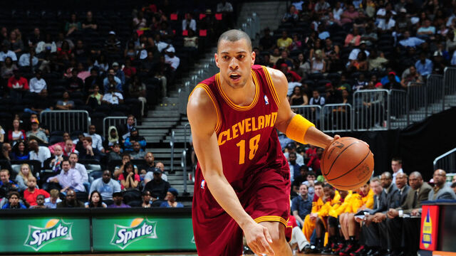 ATLANTA, GA - MARCH 21: Anthony Parker #18 of the Cleveland Cavaliers handles the ball against the Atlanta Hawks on March 21, 2012 at Philips Arena in Atlanta, Georgia. NOTE TO USER: User expressly acknowledges and agrees that, by downloading and/or using this Photograph, user is consenting to the terms and conditions of the Getty Images License Agreement. Mandatory Copyright Notice: Copyright 2012 NBAE