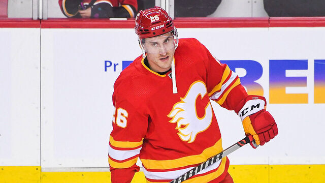 CALGARY, CANADA - APRIL 2: Michael Stone #26 of the Calgary Flames in action against the Anaheim Ducks during an NHL game at Scotiabank Saddledome on April 2, 2023 in Calgary, Alberta, Canada. The Flames defeated the Ducks 5-4.