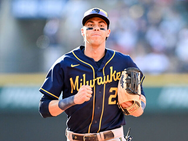 CLEVELAND, OHIO - JUNE 24: Christian Yelich #22 of the Milwaukee Brewers runs off the field after the eighth inning against the Cleveland Guardians at Progressive Field on June 24, 2023 in Cleveland, Ohio.