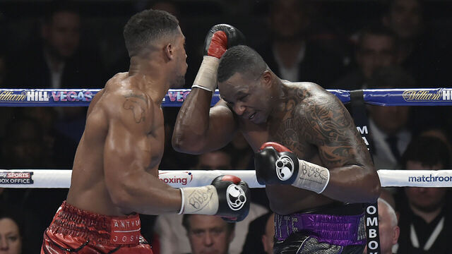 LONDON, ENGLAND - DECEMBER 12: Anthony Joshua MBE (L) boxes Dillian Whyte for the Commonwealth Heavyweight title, Vacant British Heavyweight title and WBC International Heavyweight title at The O2 Arena on December 12, 2015 in London, England. *** Local Caption ***Anthony Joshua MBE; Dillian Whyte