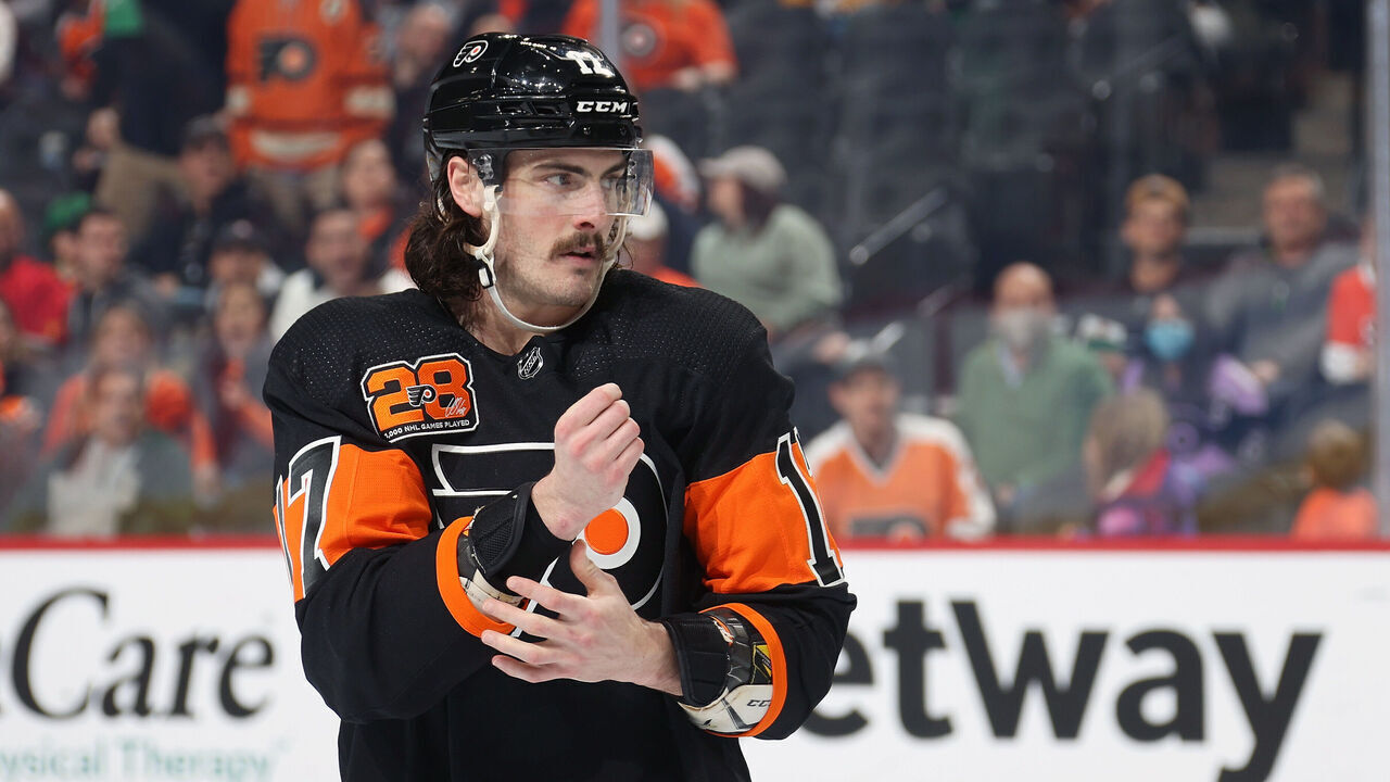PHILADELPHIA, PA - MARCH 17: Zack MacEwen #17 of the Philadelphia Flyers drops the gloves for a first period fight against the Nashville Predators at the Wells Fargo Center on March 17, 2022 in Philadelphia, Pennsylvania.