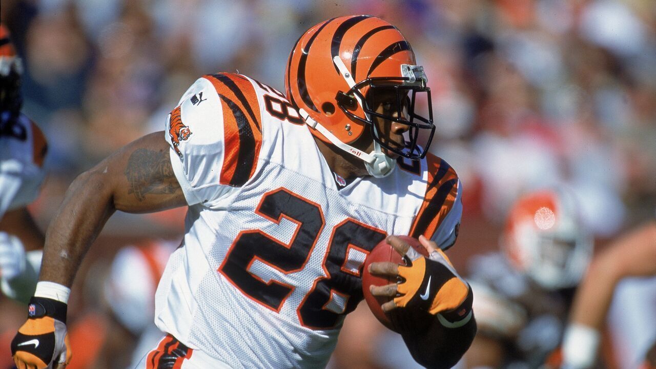 29 Oct 2000: Corey Dillon #28 of the Cincinnati Bengals runs with the ball during the game against the Cleveland Browns at the Browns Stadium in Cleveland, Ohio. The Bengals defeated the Browns 12-3.Mandatory Credit: Jonathan Daniel /Allsport
