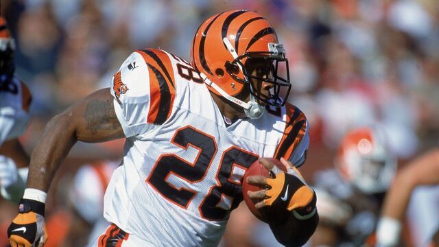 29 Oct 2000: Corey Dillon #28 of the Cincinnati Bengals runs with the ball during the game against the Cleveland Browns at the Browns Stadium in Cleveland, Ohio. The Bengals defeated the Browns 12-3.Mandatory Credit: Jonathan Daniel /Allsport