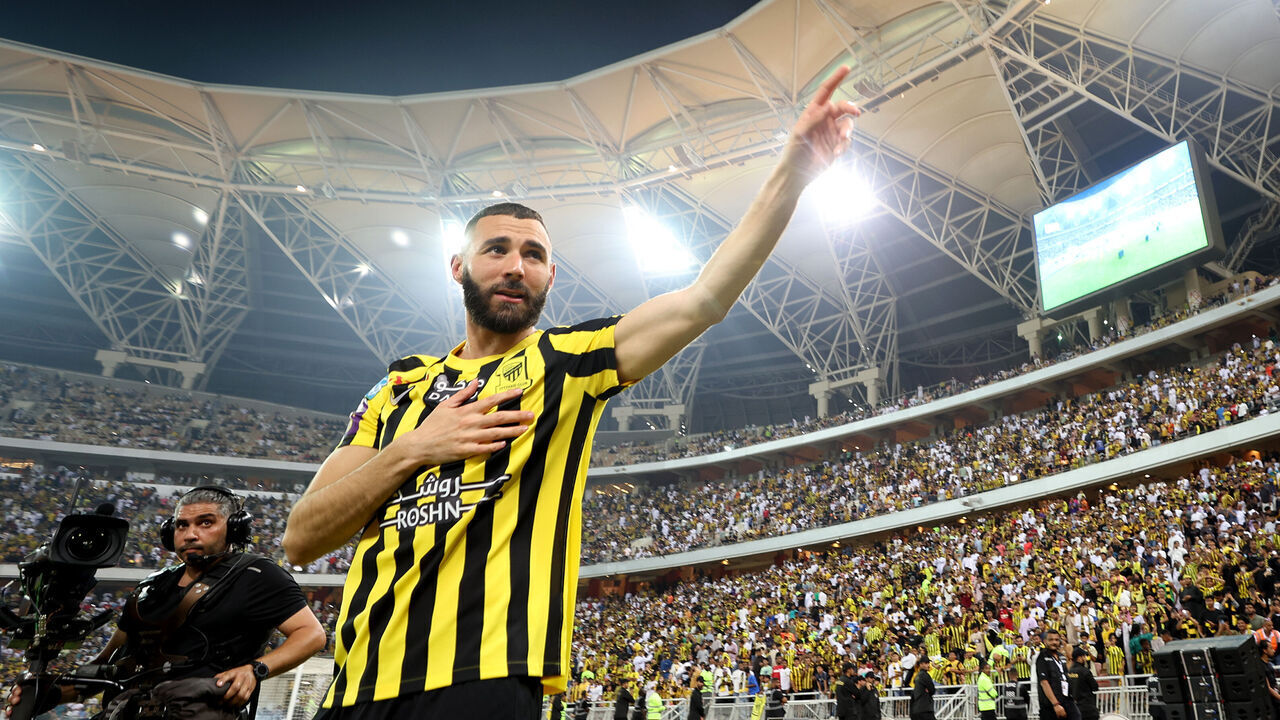 JEDDAH, SAUDI ARABIA - JUNE 08: Karim Benzema acknowledges the fans as they are presented to the crowd during the Karim Benzema Official Reception event at King Abdullah Sports City on June 08, 2023 in Jeddah, Saudi Arabia.