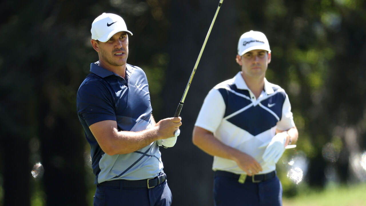 NORTH PLAINS, OREGON - JUNE 30: Team Captain Brooks Koepka of Smash GC and Matt Wolff of Hy Flyers GC look on from the 11th hole during day one of the LIV Golf Invitational - Portland at Pumpkin Ridge Golf Club on June 30, 2022 in North Plains, Oregon.
