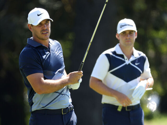 NORTH PLAINS, OREGON - JUNE 30: Team Captain Brooks Koepka of Smash GC and Matt Wolff of Hy Flyers GC look on from the 11th hole during day one of the LIV Golf Invitational - Portland at Pumpkin Ridge Golf Club on June 30, 2022 in North Plains, Oregon.