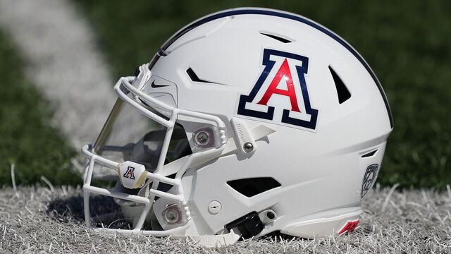 BERKELEY, CALIFORNIA - SEPTEMBER 24: A detailed view of the helmet belonging to quarterback Jayden de Laura #7 of the Arizona Wildcats sitting on the field during pregame warmups prior to play the California Golden Bears at FTX Field at California Memorial Stadium on September 24, 2022 in Berkeley, California.