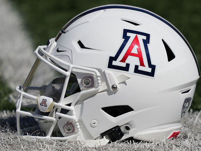 BERKELEY, CALIFORNIA - SEPTEMBER 24: A detailed view of the helmet belonging to quarterback Jayden de Laura #7 of the Arizona Wildcats sitting on the field during pregame warmups prior to play the California Golden Bears at FTX Field at California Memorial Stadium on September 24, 2022 in Berkeley, California.