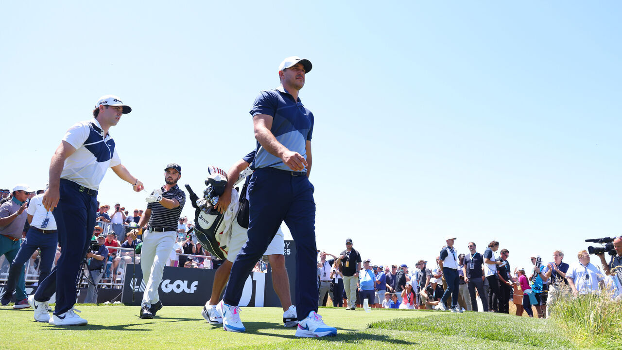 NORTH PLAINS, OREGON - JUNE 30: Team Captain Brooks Koepka of Smash GC walks off the first tee with Matt Wolff of Hy Flyers GC and Abraham Ancer of Fireballs GC during day one of the LIV Golf Invitational - Portland at Pumpkin Ridge Golf Club on June 30, 2022 in North Plains, Oregon.