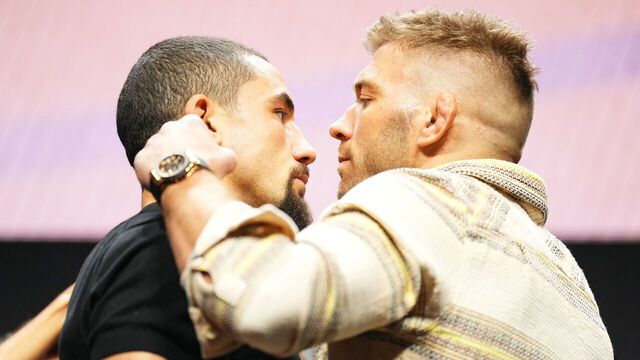 LAS VEGAS, NEVADA - JULY 06: (L-R) Opponents Robert Whittaker of New Zealand and Dricus Du Plessis of South Africa face off during the UFC 290 press conference at T-Mobile Arena on July 06, 2023 in Las Vegas, Nevada.