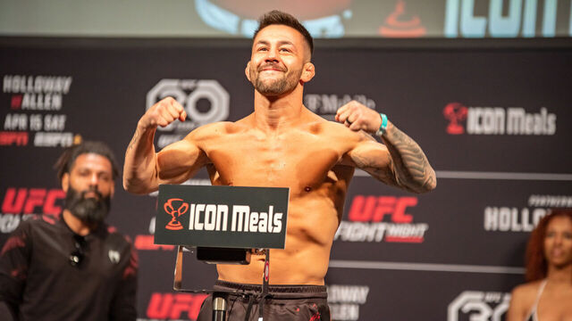 KANSAS CITY, MISSOURI - APRIL 14: (L-R) Pedro Munhoz and Chris Gutierrez step on the scales and face off at the ceremonial weigh ins for UFC Fight Night Kansas City on April 14, 2023, at the T-Mobile Center in Kansas City, MO.