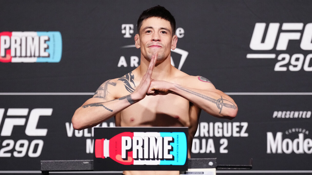 LAS VEGAS, NEVADA - JULY 07: Brandon Moreno of Mexico poses on the scale during the UFC 290 official weigh-in at UFC APEX on July 07, 2023 in Las Vegas, Nevada.