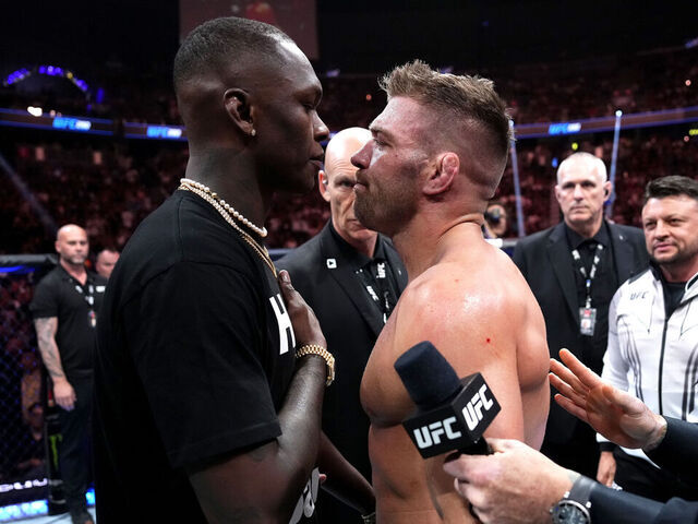 LAS VEGAS, NEVADA - JULY 08: UFC middleweight champion Israel Adesanya faces off against Dricus Du Plessis of South Africa during the UFC 290 event at T-Mobile Arena on July 08, 2023 in Las Vegas, Nevada.