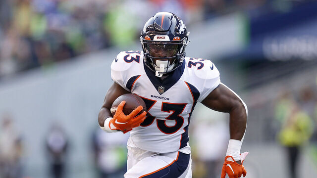 SEATTLE, WASHINGTON - SEPTEMBER 12: Javonte Williams #33 of the Denver Broncos carries the ball during the first quarter against the Seattle Seahawks at Lumen Field on September 12, 2022 in Seattle, Washington.