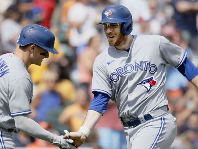 Toronto Blue Jays' Daulton Varsho (25) celebrates his solo home