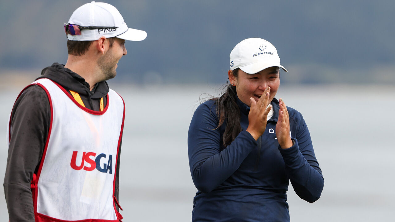 PEBBLE BEACH, CALIFORNIA - JULY 09: Allisen Corpuz of the United States celebrates with her caddie Jay Monahan after winning on the 18th green during the final round of the 78th U.S. Women's Open at Pebble Beach Golf Links on July 09, 2023 in Pebble Beach, California.
