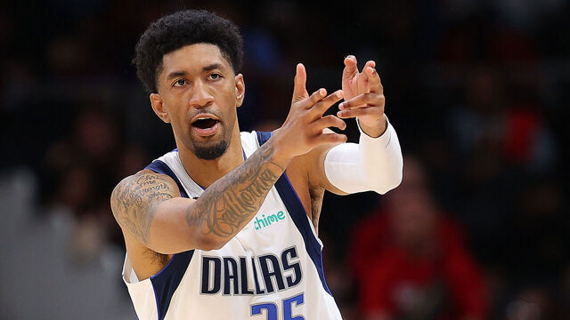 ATLANTA, GEORGIA - APRIL 02: Christian Wood #35 of the Dallas Mavericks drives against the Atlanta Hawks during overtime at State Farm Arena on April 02, 2023 in Atlanta, Georgia.