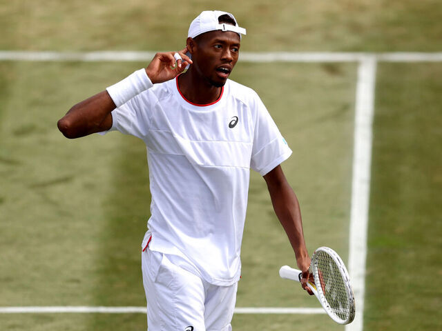 LONDON, ENGLAND - JULY 10: Christopher Eubanks of United States celebrates against Stefanos Tsitsipas of Greece in the Men's Singles fourth round match during day eight of The Championships Wimbledon 2023 at All England Lawn Tennis and Croquet Club on July 10, 2023 in London, England.
