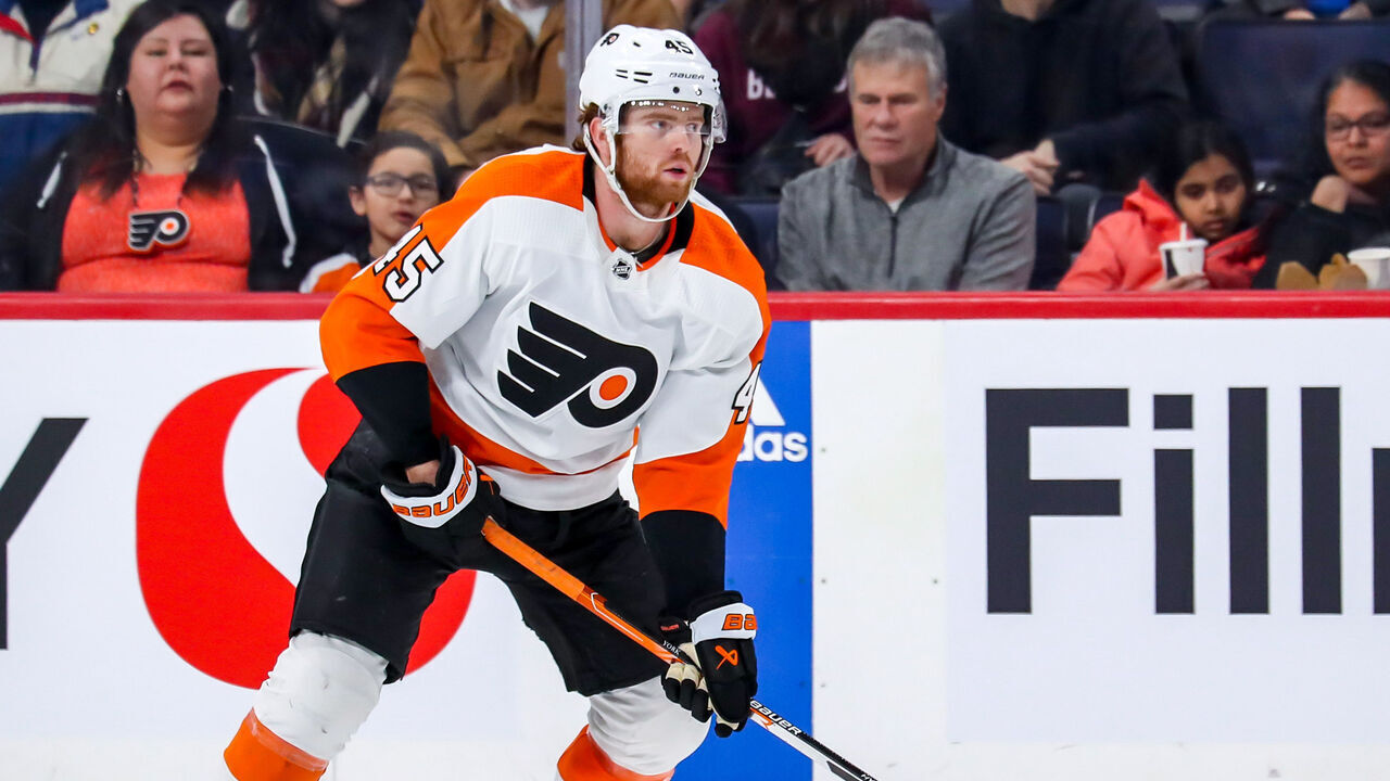WINNIPEG, CANADA - JANUARY 28: Cam York #45 of the Philadelphia Flyers plays the puck up the ice during second period action against the Winnipeg Jets at the Canada Life Centre on January 28, 2023 in Winnipeg, Manitoba, Canada. The Flyers shutout the Jets 4-0.