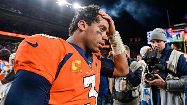 DENVER, CO - JANUARY 8: Denver Broncos quarterback Russell Wilson (3) on the field after a win against the Los Angeles Chargers after a game at Empower Field at Mile High on January 8, 2023 in Denver, Colorado.