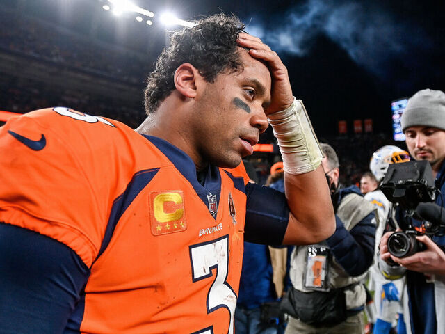 DENVER, CO - JANUARY 8: Denver Broncos quarterback Russell Wilson (3) on the field after a win against the Los Angeles Chargers after a game at Empower Field at Mile High on January 8, 2023 in Denver, Colorado.