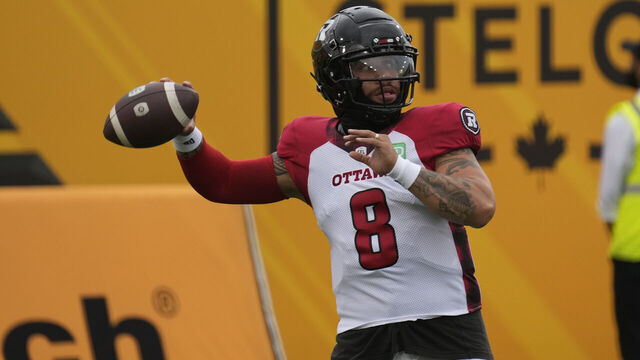 HAMILTON, CANADA - JULY 8: Jeremiah Masoli #8 of the Ottawa Redblacks goes to throw a pass during warm up before a game against the Hamilton Tiger-Cats at Tim Hortons Field on July 8, 2023 in Hamilton, Canada.