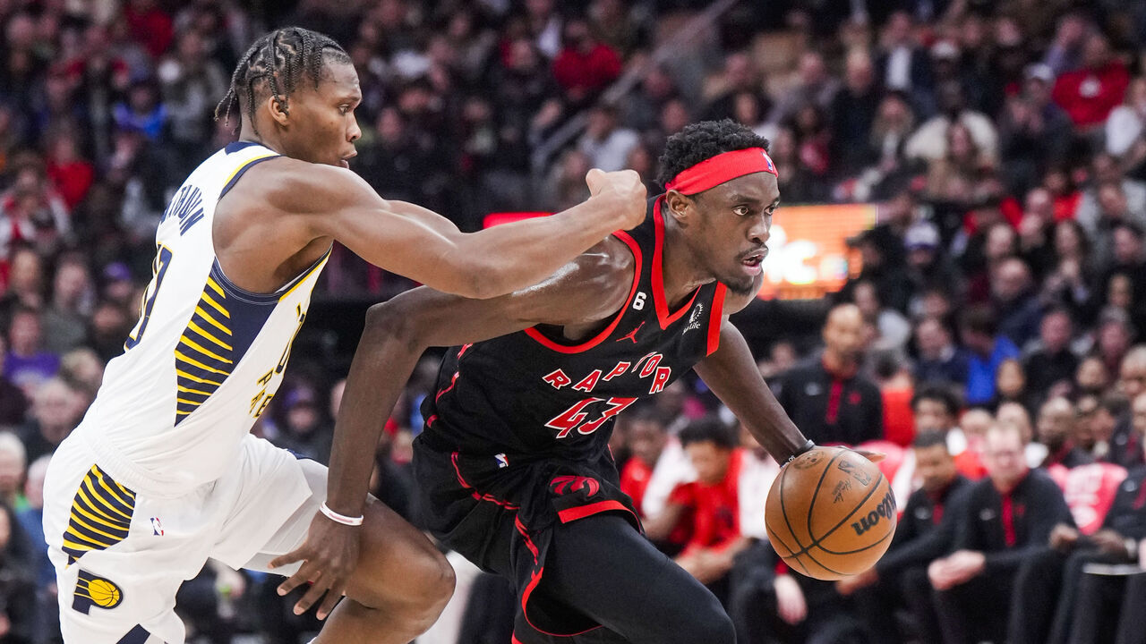 TORONTO, ON - MARCH 22: Pascal Siakam #43 of the Toronto Raptors drives against Bennedict Mathurin #00 of the Indiana Pacers of the Indiana Pacersduring the second half of their basketball game at the Scotiabank Arena on March 22, 2023 in Toronto, Ontario, Canada. NOTE TO USER: User expressly acknowledges and agrees that, by downloading and/or using this Photograph, user is consenting to the terms and conditions of the Getty Images License Agreement.