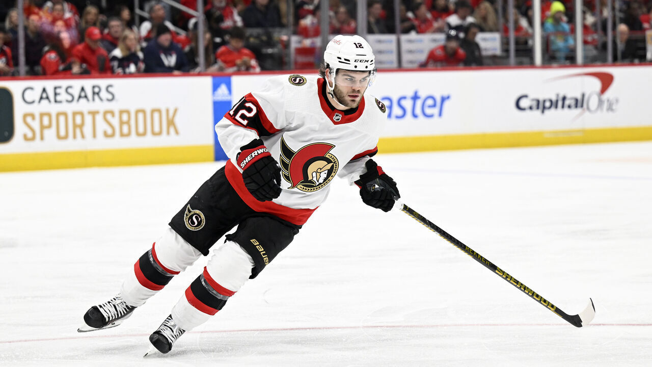 WASHINGTON, DC - DECEMBER 29: Alex DeBrincat #12 of the Ottawa Senators skates down the ice against the Washington Capitals at Capital One Arena on December 29, 2022 in Washington, DC.