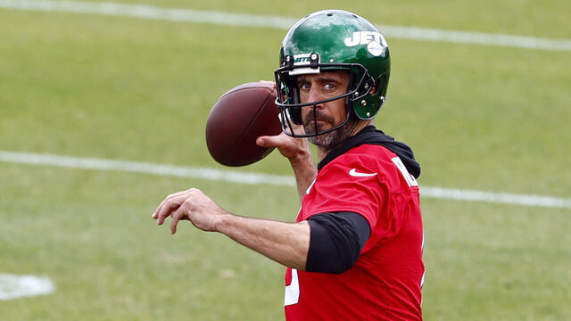 FLORHAM PARK, NEW JERSEY - JUNE 9: Quarterback Aaron Rodgers #8 of the New York Jets attempts a pass during the team's OTA's at Atlantic Health Jets Training Center on June 9, 2023 in Florham Park, New Jersey.