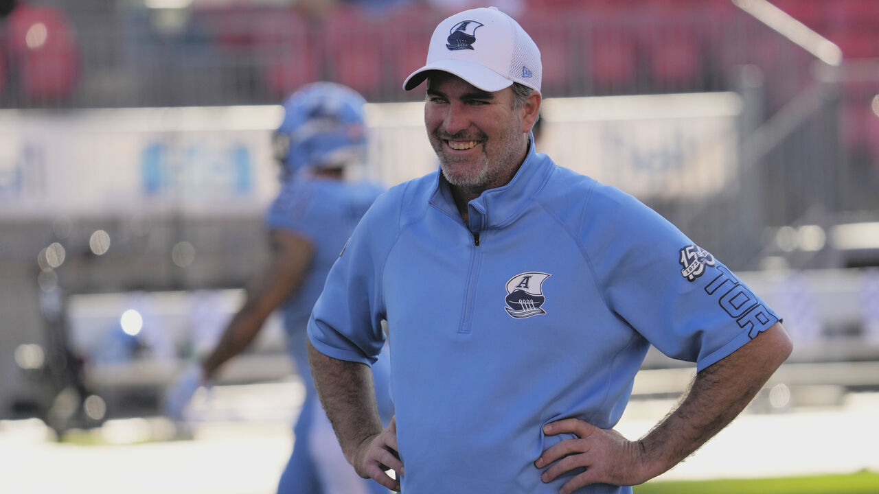 TORONTO, CANADA - JULY 3: Head coach Ryan Dinwiddie of the Toronto Argonauts during warm-ups before a game against the BC Lions at BMO Field on July 3, 2023 in Toronto, Canada.