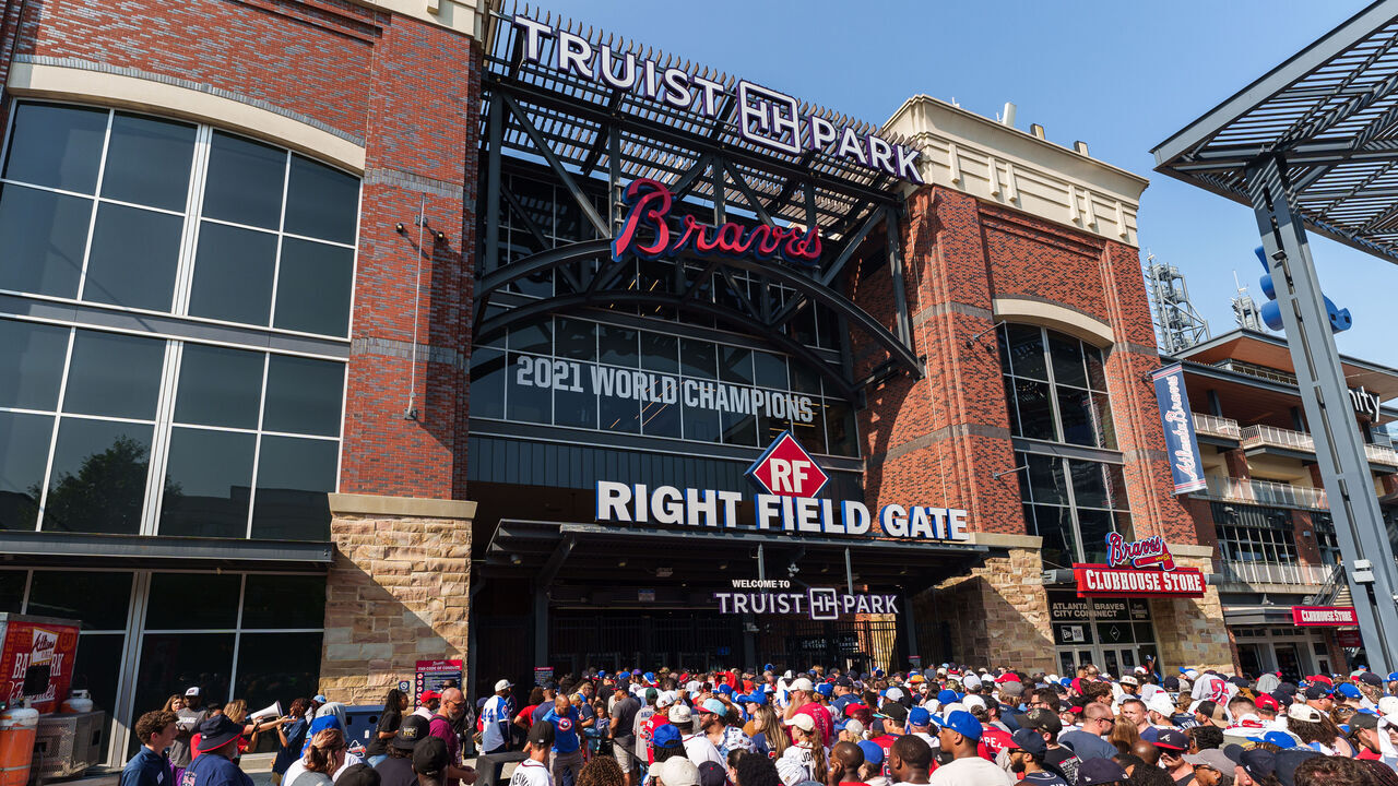 ATLANTA, GA - MAY 25: Fans line up outside Truist Park for the Outkast bobblehead give away before the game between the Atlanta Braves and the Philadelphia Phillies at Truist Park on May 25, 2023 in Atlanta, Georgia.