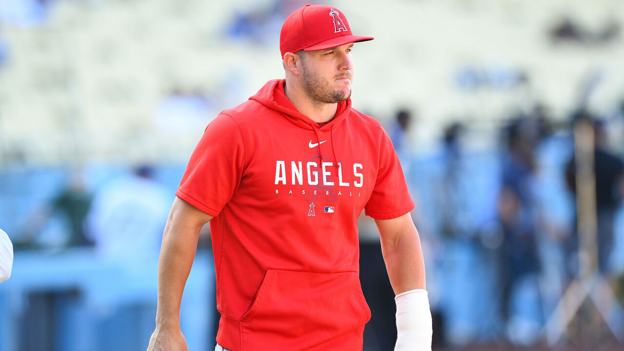 LOS ANGELES, CA - JULY 07: Los Angeles Angels center fielder Mike Trout (27), with a cast on his left hand, looks on during batting practice before the MLB game between the Los Angeles Angels and the Los Angeles Dodgers on July 7, 2023 at Dodger Stadium in Los Angeles, CA.
