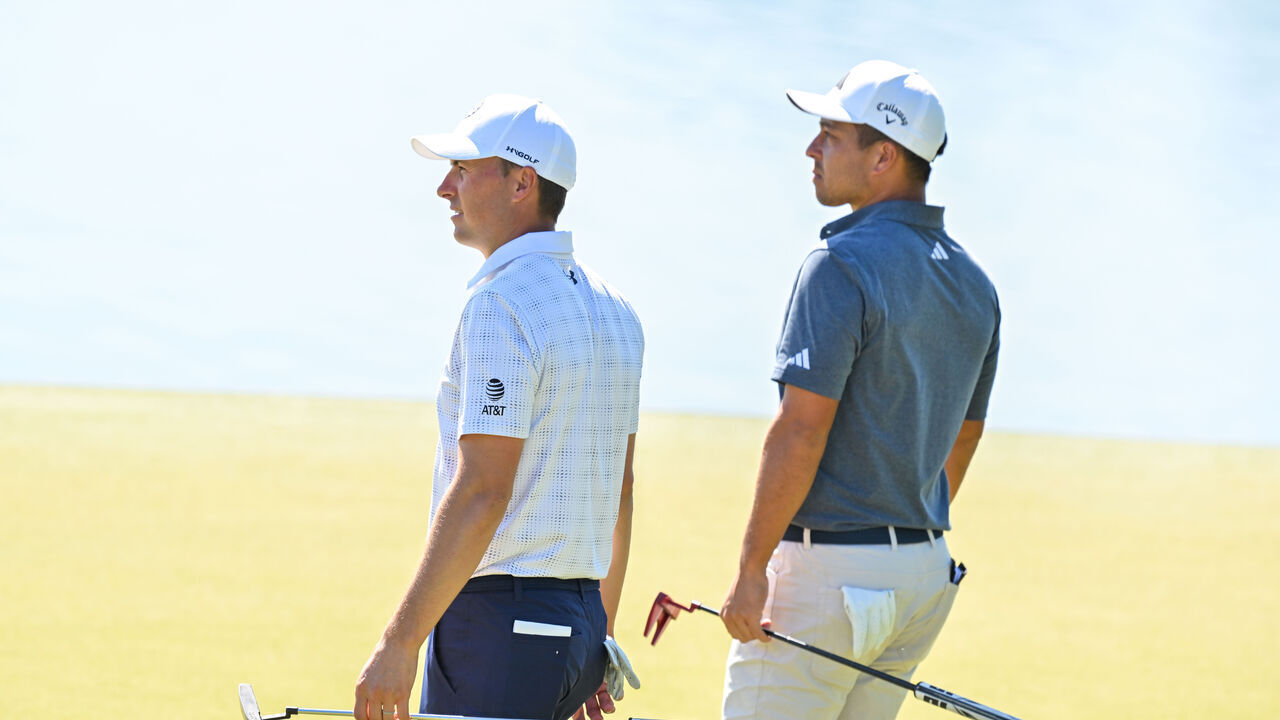 CHARLOTTE, NORTH CAROLINA - MAY 04: Xander Schauffele and Jordan Spieth walk together on the 14th green during the first round of the Wells Fargo Championship at Quail Hollow Club on May 4, 2023 in Charlotte, North Carolina.