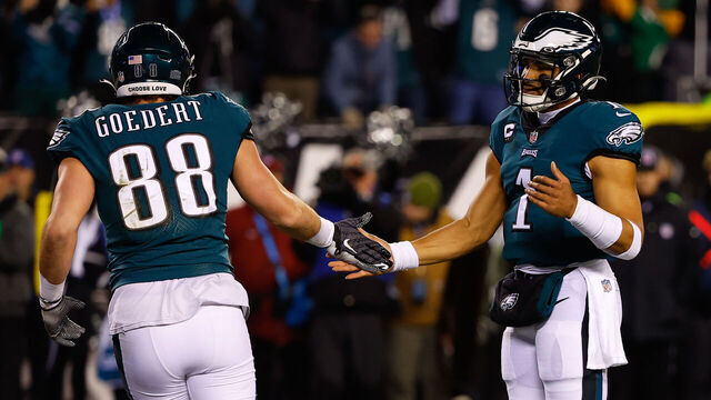 PHILADELPHIA, PA - JANUARY 21: Philadelphia Eagles quarterback Jalen Hurts (1) high fives Philadelphia Eagles tight end Dallas Goedert (88) after a touchdown during the NFC Divisional playoff game between the Philadelphia Eagles and the New York Giants on January 21, 2023 at Lincoln Financial Field in Philadelphia, Pennsylvania.