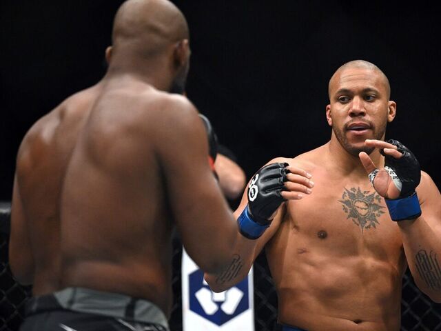 US mixed martial arts fighter Jon Jones (L) fights against French mixed martial arts fighter Ciryl Gane during their UFC 285 heavyweight title bout at T-Mobile Arena, in Las Vegas, Nevada, on March 4, 2023.