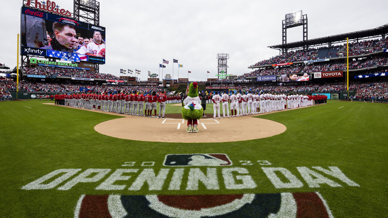 PHILADELPHIA, PA - APRIL 07:A general view of the Philadelphia Phillies and Cincinnati Reds lining up for the national anthem at Citizens Bank Park on opening day prior to the game between the Cincinnati Reds and the Philadelphia Phillies at Citizens Bank Park on Friday, April 7, 2023 in Philadelphia, Pennsylvania.