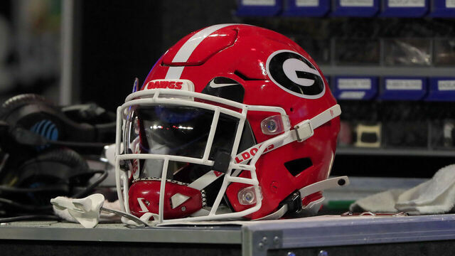 ATLANTA, GA - DECEMBER 31: A Georgia Bulldogs helmet on the sidelines during the college football playoff semifinal game between the University of Georgia Bulldogs and The Ohio State Buckeyes on December 31, 2022 at the Mercedes-Benz Stadium in Atlanta, GA.