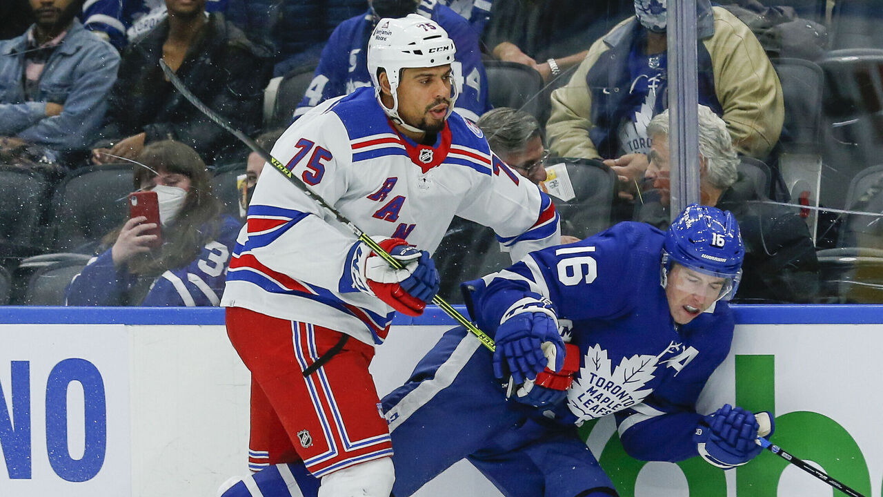 TORONTO, ON - NOVEMBER 18: New York Rangers right wing Ryan Reaves (75) rides Toronto Maple Leafs center Mitchell Marner (16) along the boards. Toronto Maple Leafs vs New York Rangers during 1st period play NHL regular season action at Scotiabank Arena in Toronto. Toronto Star/Rick Madonik (Rick Madonik/Toronto Star via Getty Images)
