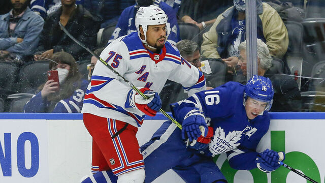TORONTO, ON - NOVEMBER 18: New York Rangers right wing Ryan Reaves (75) rides Toronto Maple Leafs center Mitchell Marner (16) along the boards. Toronto Maple Leafs vs New York Rangers during 1st period play NHL regular season action at Scotiabank Arena in Toronto. Toronto Star/Rick Madonik (Rick Madonik/Toronto Star via Getty Images)